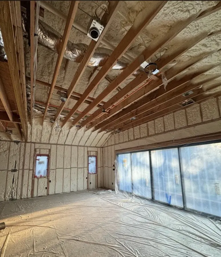 Interior walls and ceiling insulated with spray foam during new construction in Vandenberg Village
